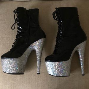 Pleaser high heeled zip up booties.